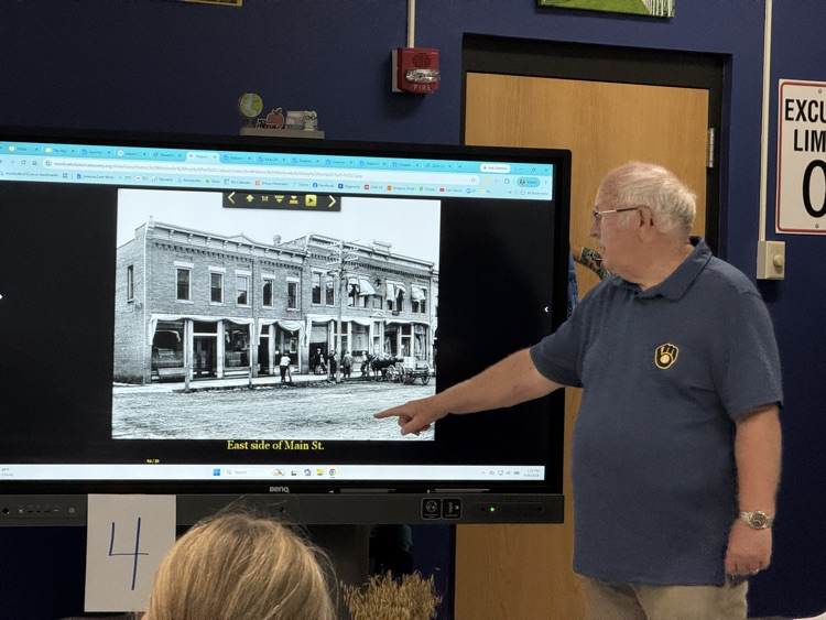 Retired teacher talking about Monticello Main Street over a century ago