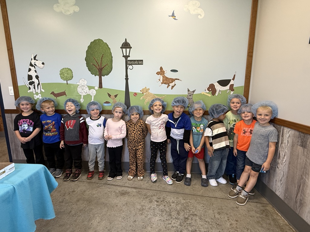 Elementary Students with Hair Nets on at Veterinarian Clinic