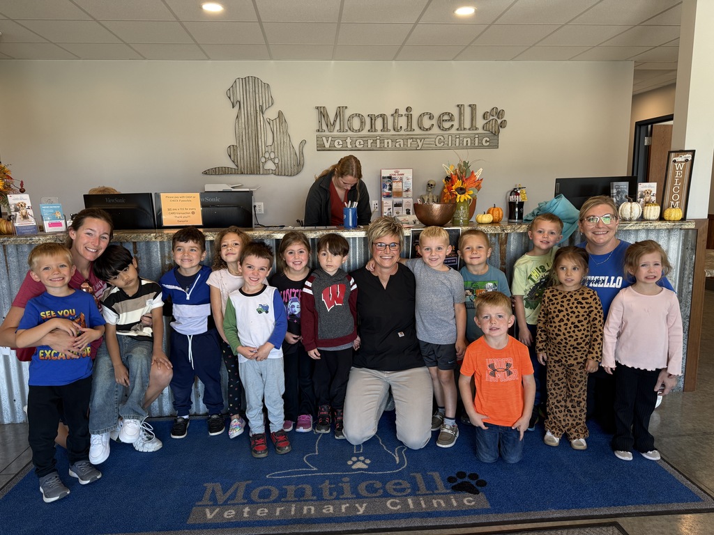 Elementary Students, Teacher and Veterinarian at the Vet's Office
