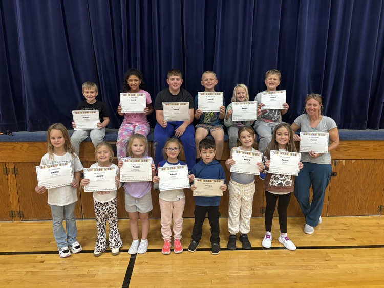 Students and staff with awards.