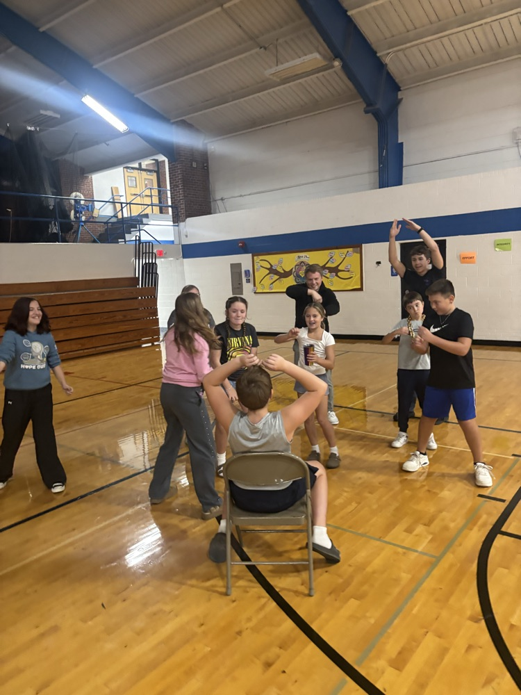 Students playing charades. 