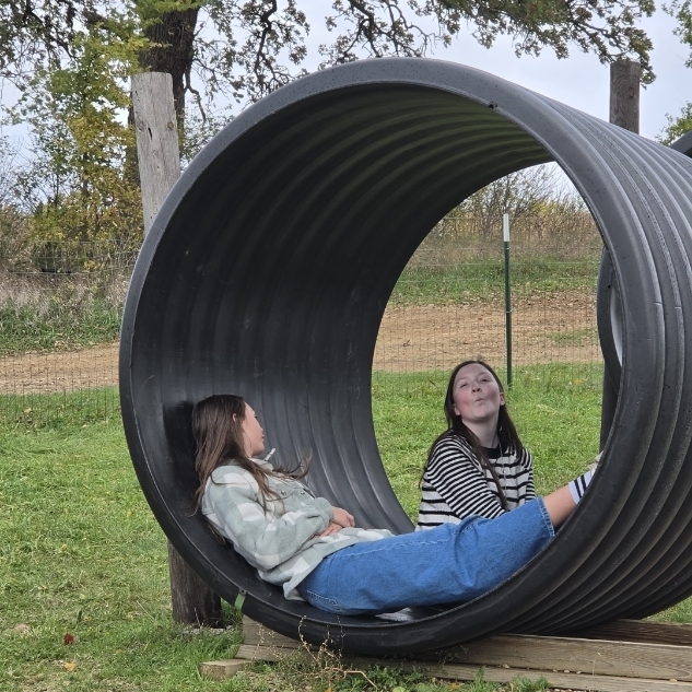 Girls in tube.