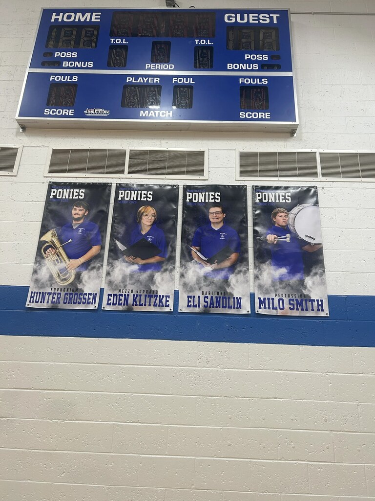 Four senior band member banners.