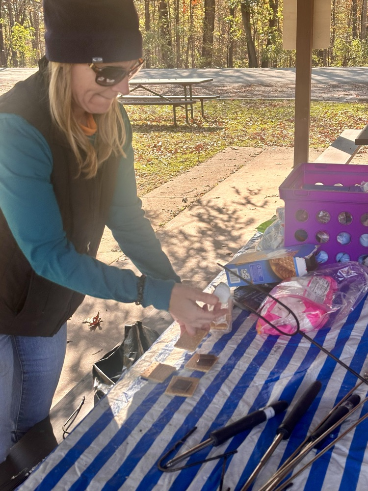 Nurse preparing s'mores.