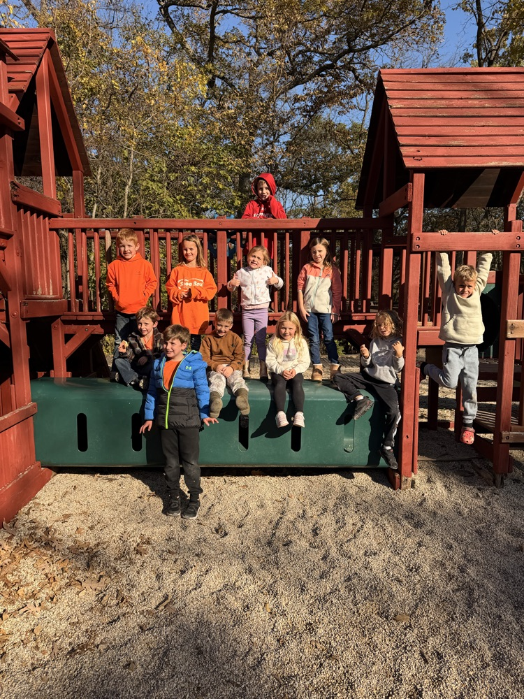 Children on playground equipment.