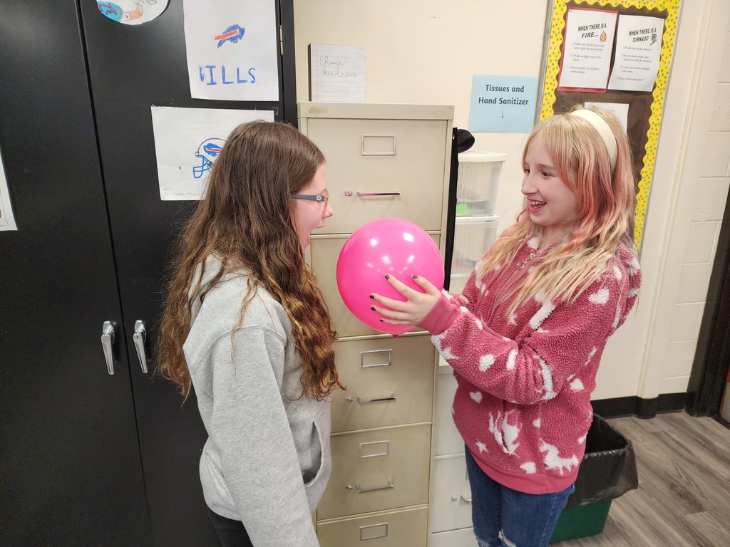 Students are exploring sound vibrations.