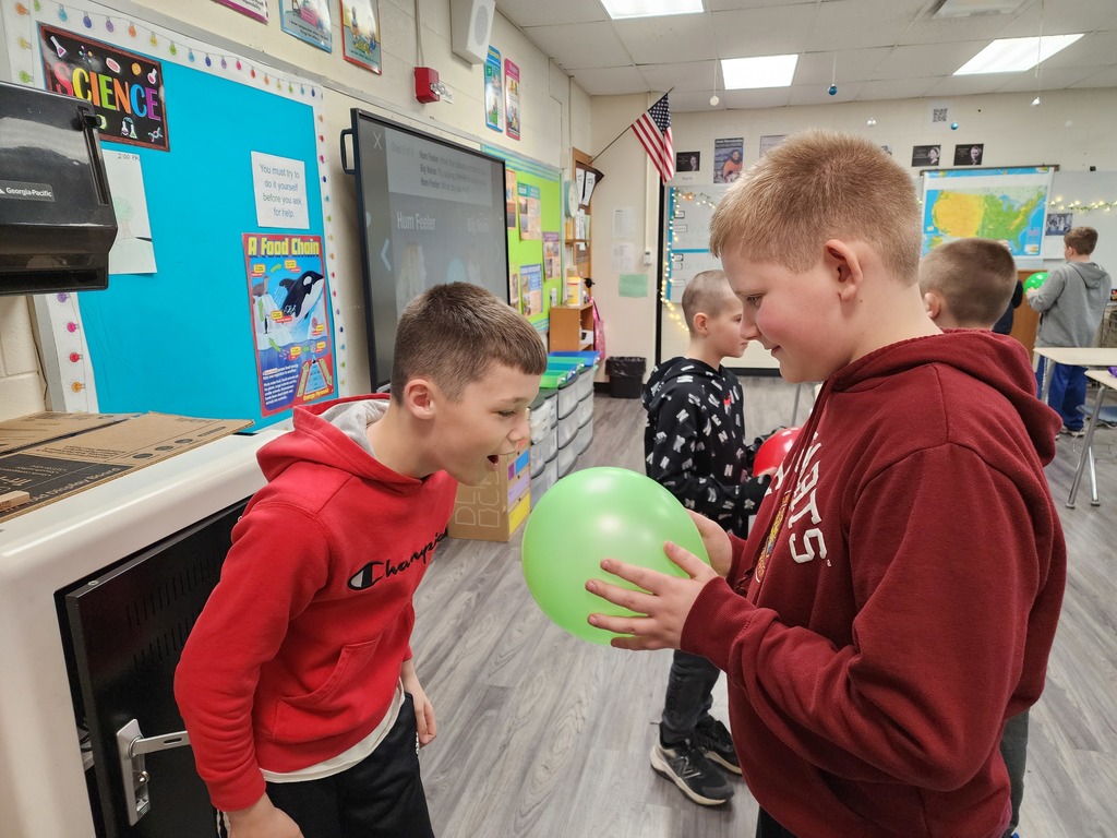 Students are exploring sound vibrations.