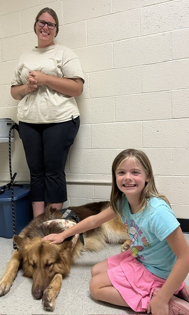 It's a RUFF life, but someone has to do it. Thank you Miss Swanson for bringing Onyx to mkeet our students tonight.