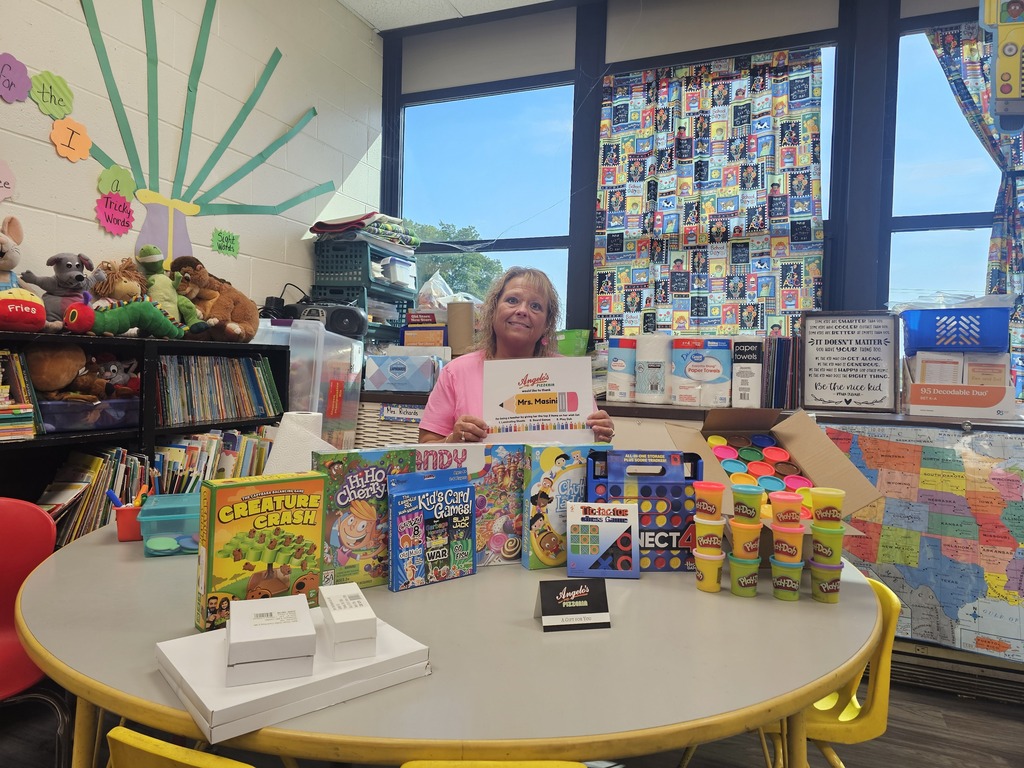 Mrs. Masini won school supplies and games for her classroom! Thank you Angelos 2! 