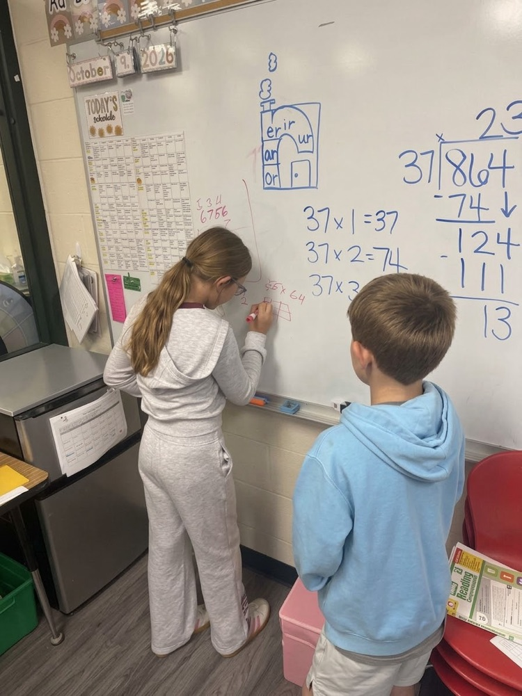 A 4th grade student being a leader in the classroom