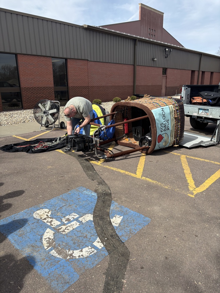 Hooking up the propane tanks.