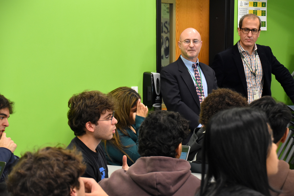 Seniors in the Montville Township High School AP American Government and Politics class ask members of Congresswoman Mikie Sherrill’s (NJ 11th) staff about the role of public service in community, as well as careers in public service. Social Studies teacher Scott Riotto and Principal Douglas Sanford look on.