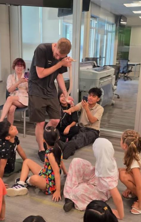 Snake and students -- The district's Multilingual Academy kicked off the summer learning about animals! Rizzo’s Wildlife World let the students hold Ferrets & Lizards & Snakes -- Ohmy! What a GREAT  educational show! See MORE PICS: https://www.instagram.com/p/DL2bkaeM8W2/  Instagram: eslfamilyoutreach highlights this summer's Academy at #MTHS! Over 40 students in grades 1-12!