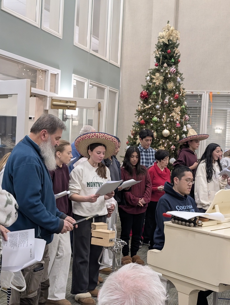 Members of the MTHS Key Club caroling at Mira Vie