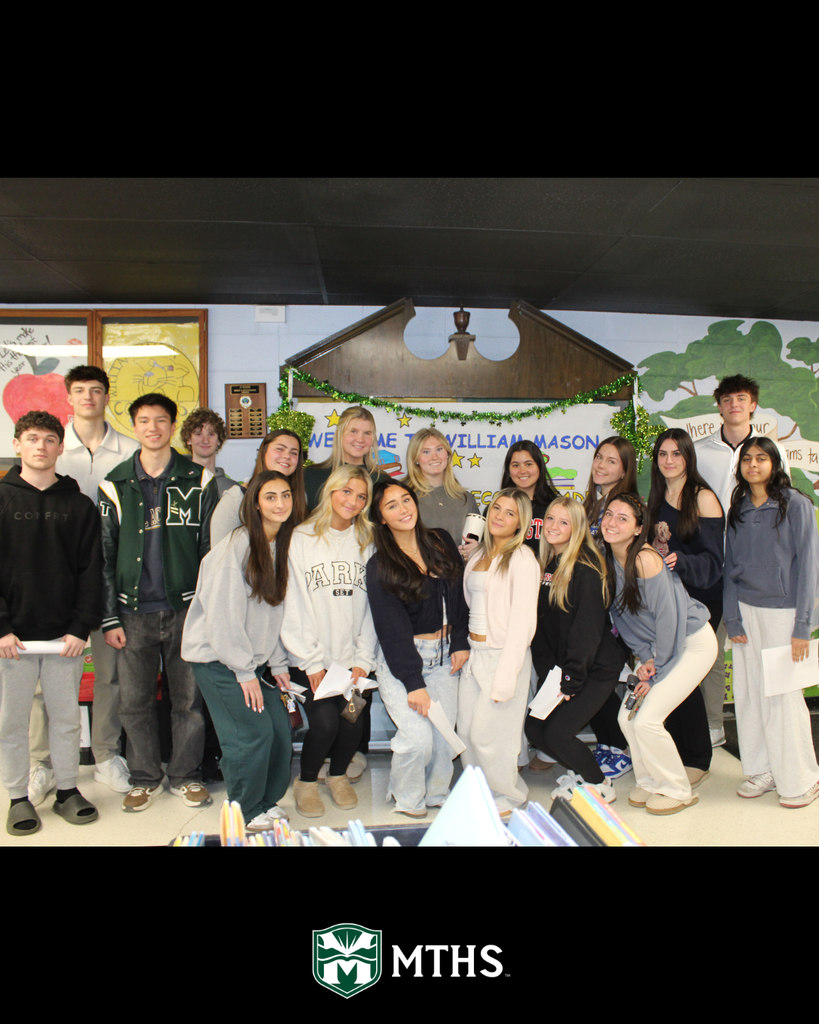 Twelfth grade students travel back to their elementary schools to celebrate Read Across America