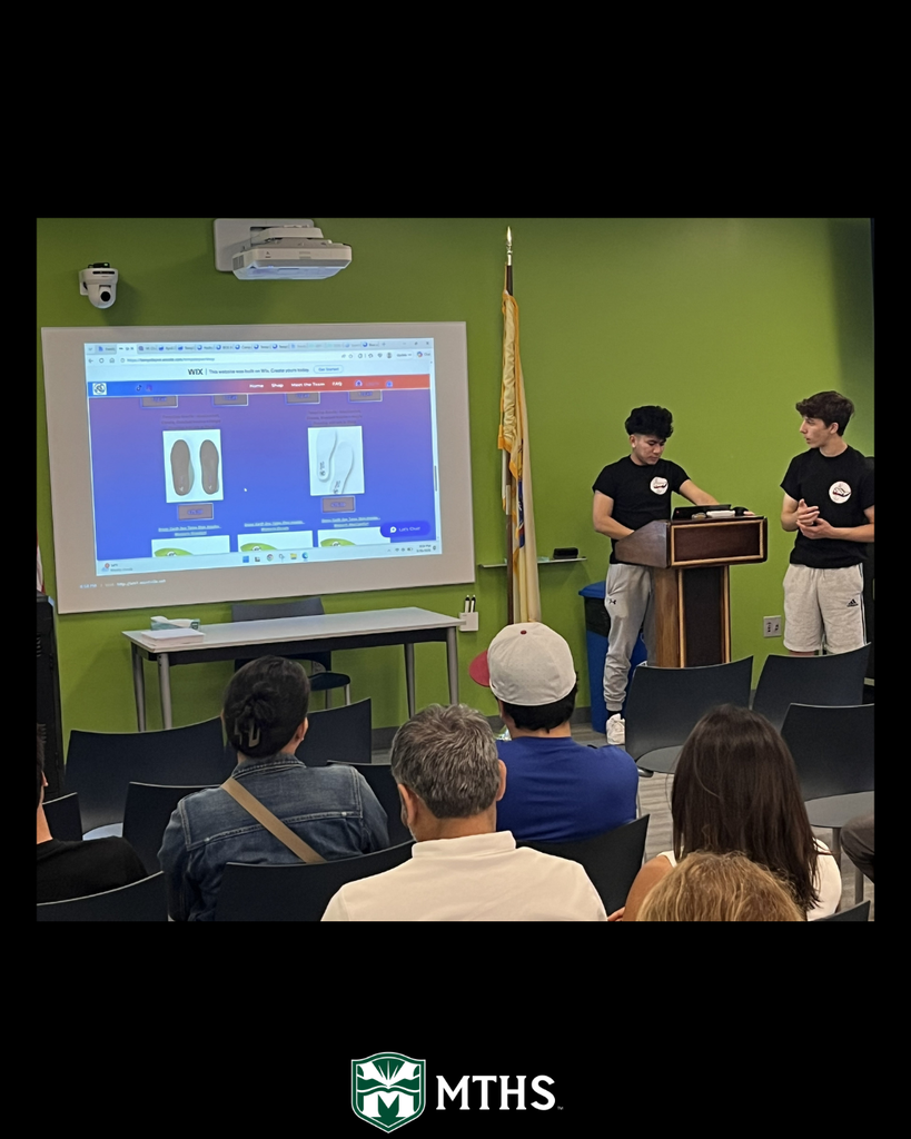 Mr. Connolly's International Business Practice Firm (IBPF) Family Night present mockups of their product