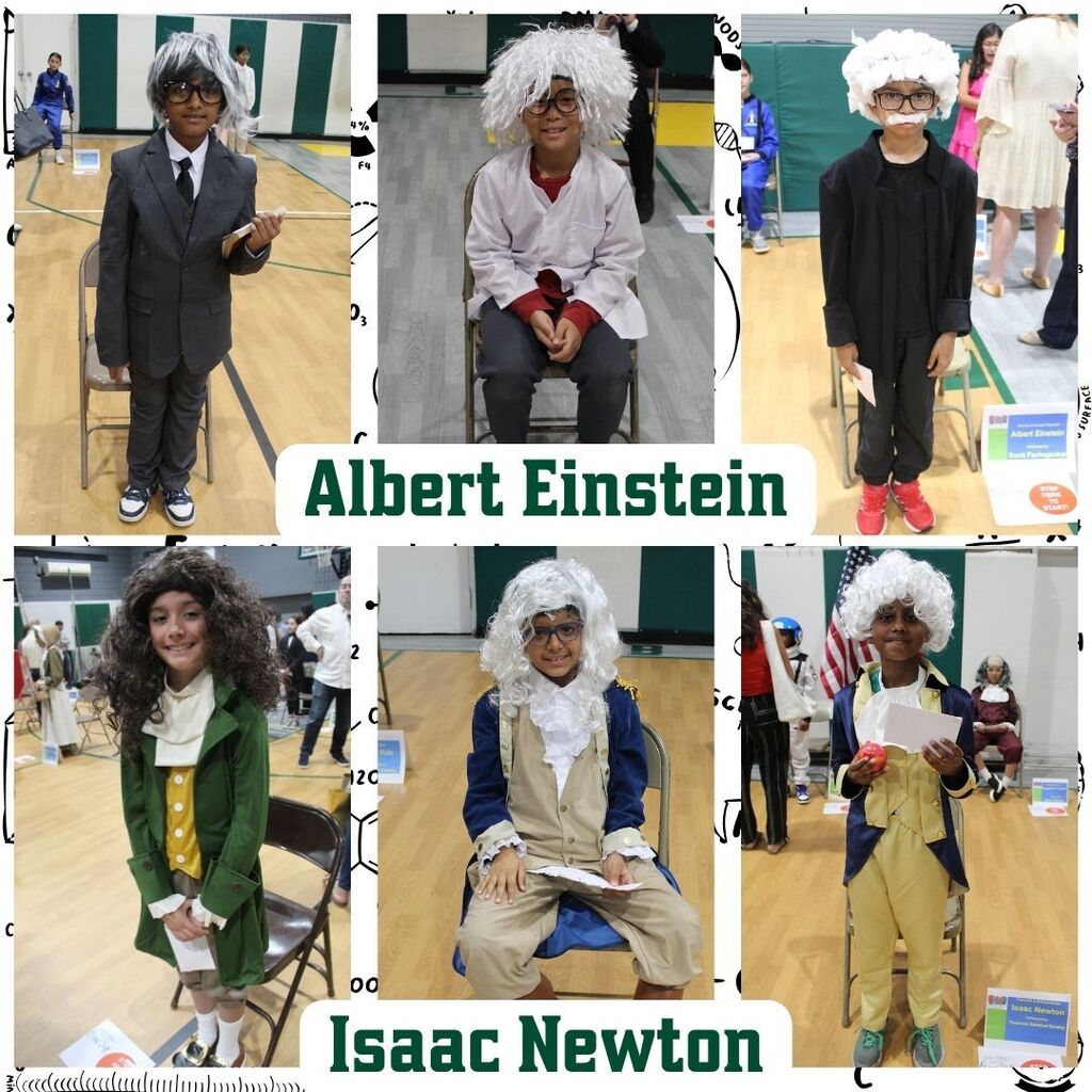 Children dressed as historical figures Albert Einstein and Isaac Newton. Each child wears a wig and period-specific attire, smiling in a school setting.