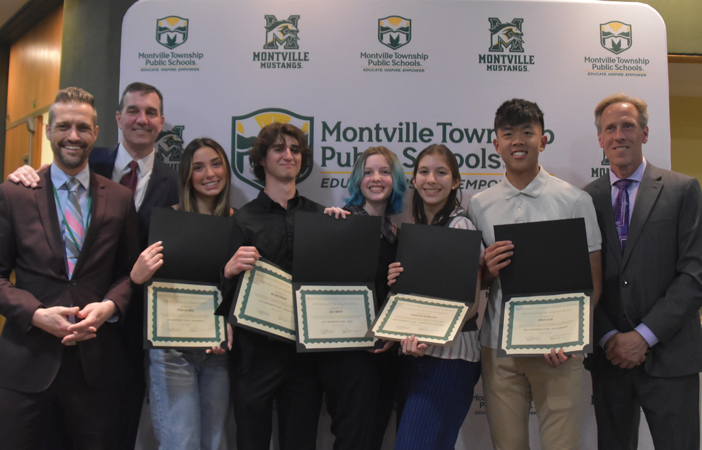The Montville Township Board of Education honored the five third quarter Montville Township High School ShopRite STARS on Tuesday, April 16, 2024. Pictured are: MTHS Assistant Principal Kenneth Nadzak, Superintendent Dr. Thomas Gorman, Tessa Kunkel (Academics), Eli Kaufman (Athletics), Leo Ervey (Arts), Marlina Barbour (Community Service), Ryan Sun (Leadership), and Montville Township Board of Education President Dr. David Modrak.