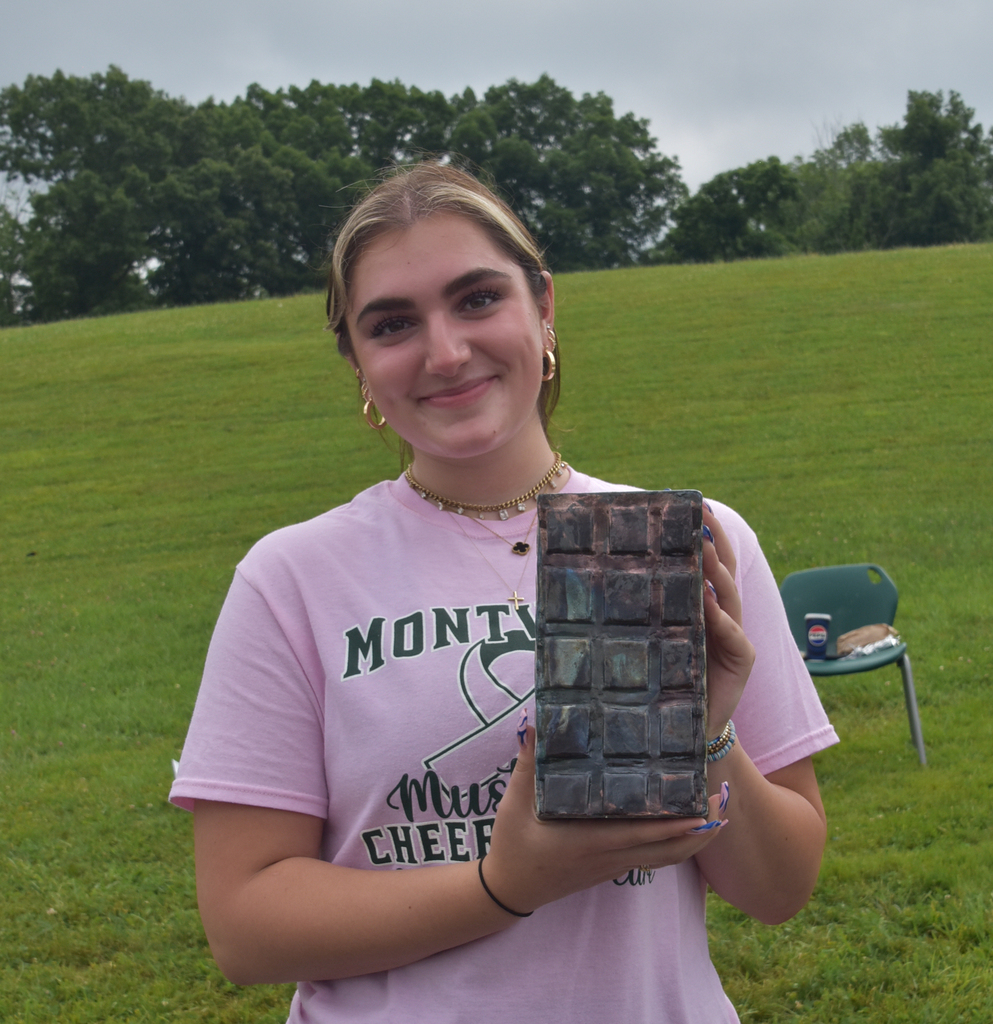 Megan Haley with the block vase fired using the Raku technique. The sophomore fired a series of block vases at the Montville Township High School in-school Raku field trip.
