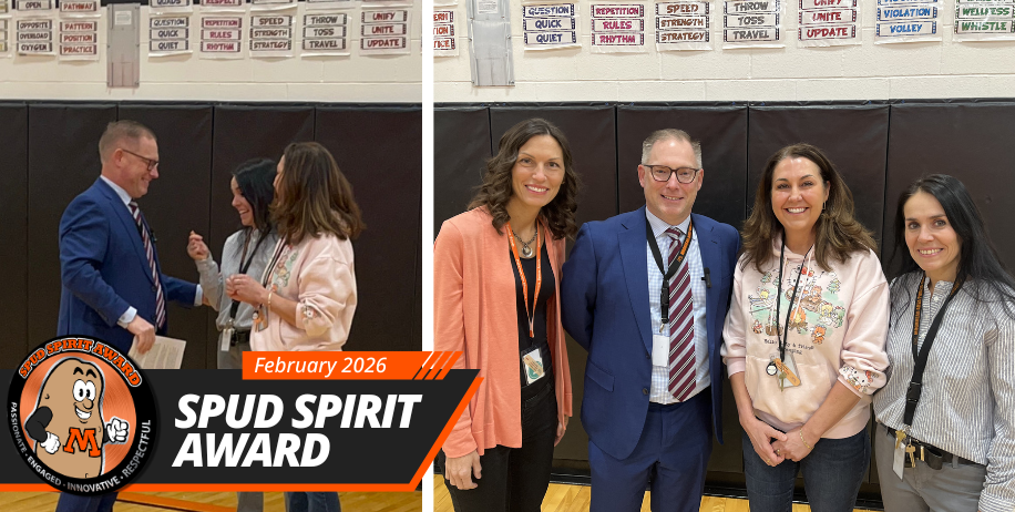 Dr. Lunak presents the Spud Spirit Award to Kit Anderson and Carolina Aleman