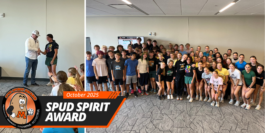 Lisa Grafstrom accepts her Spud Spirit Award from Superintendent Lunak with the Cross Country team