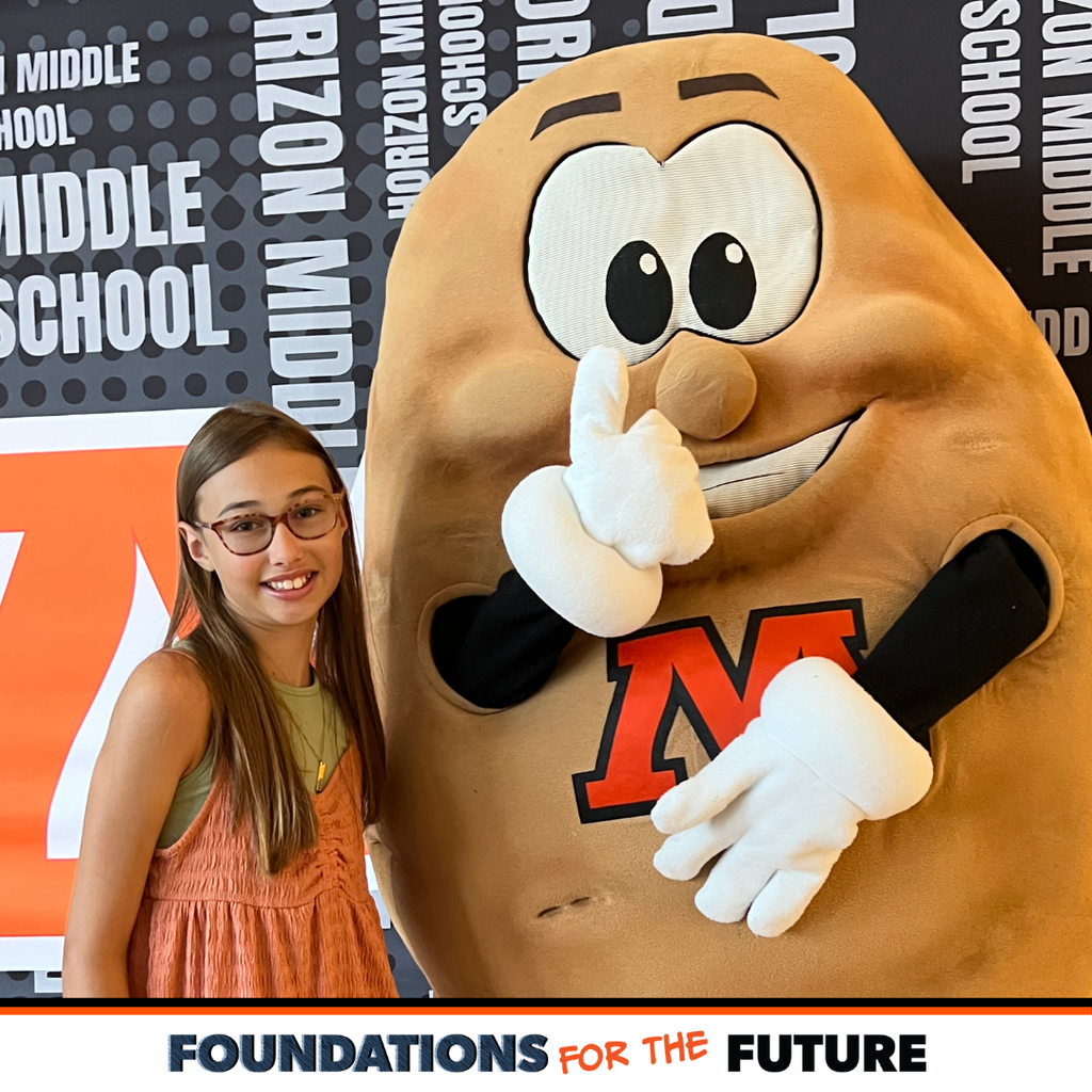 Horizon Middle School student with Spuddy