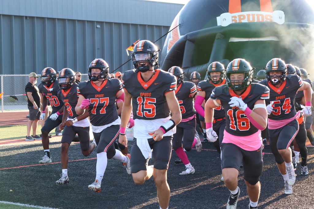 Football team running out on to the field