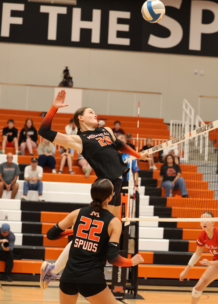 Madysen Geist spiking the ball