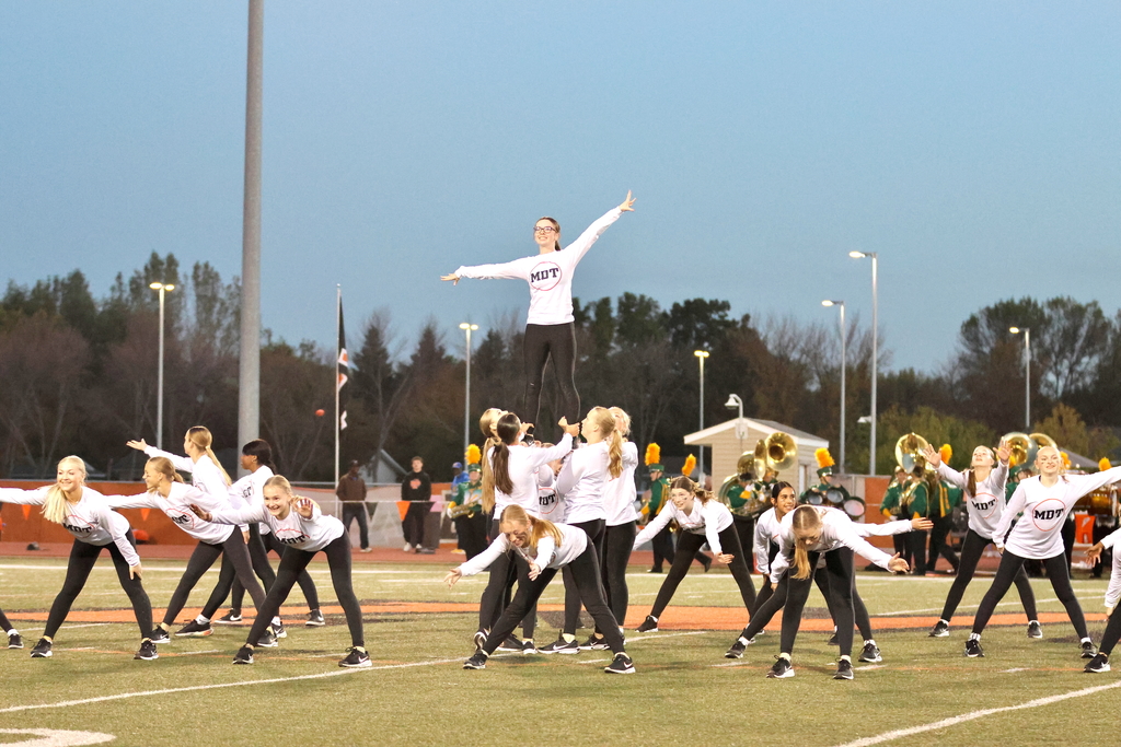 Moorhead Fall dance team performs at halftime and executes fun lift