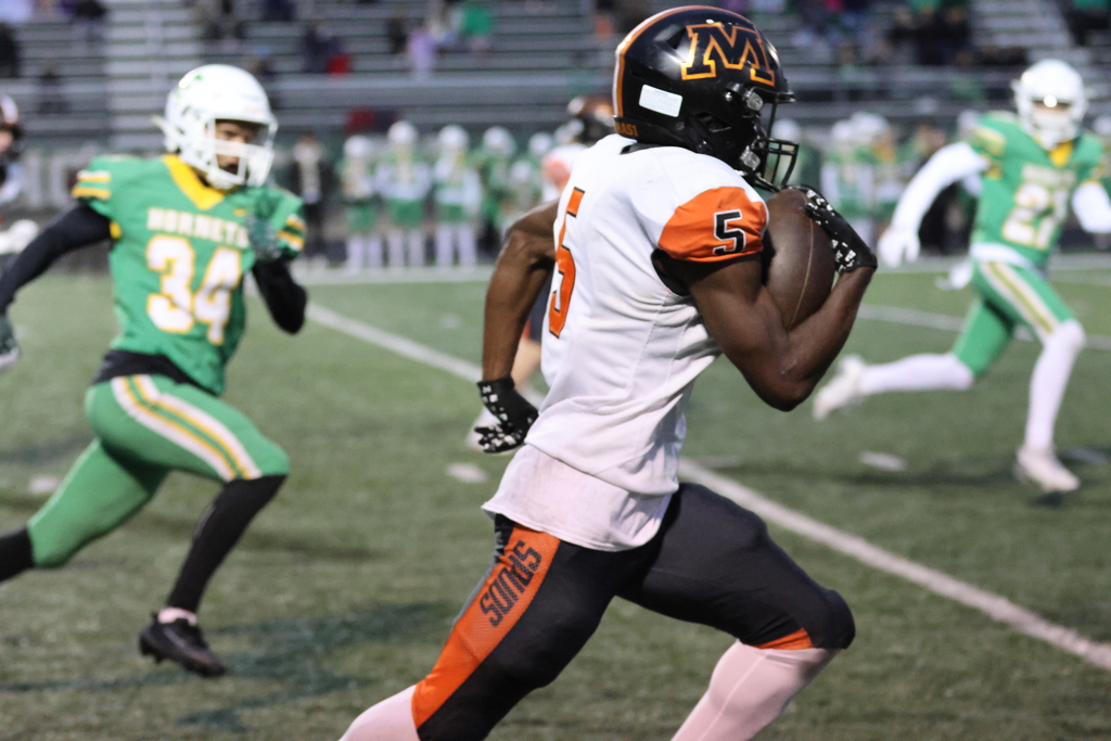 Madison Suah rushing the ball