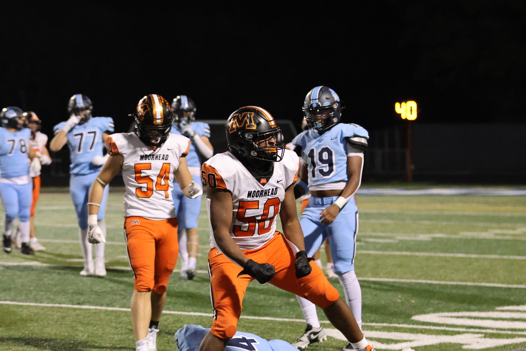 Genesis Kamara Celebrating a tackle
