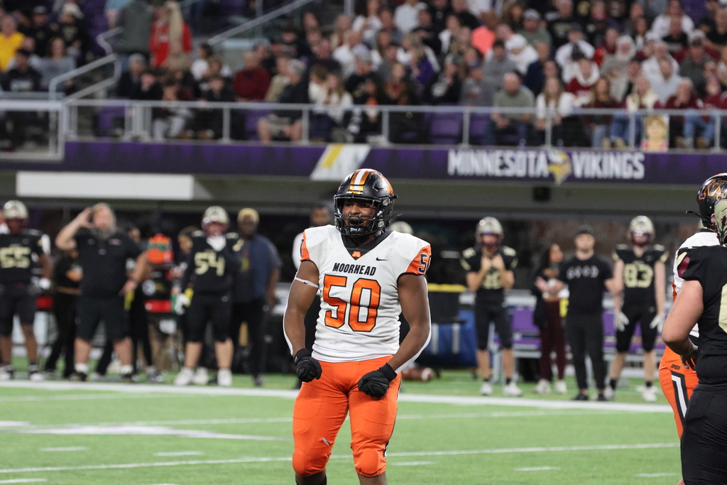 Genesis Kamara Celebrating a tackle