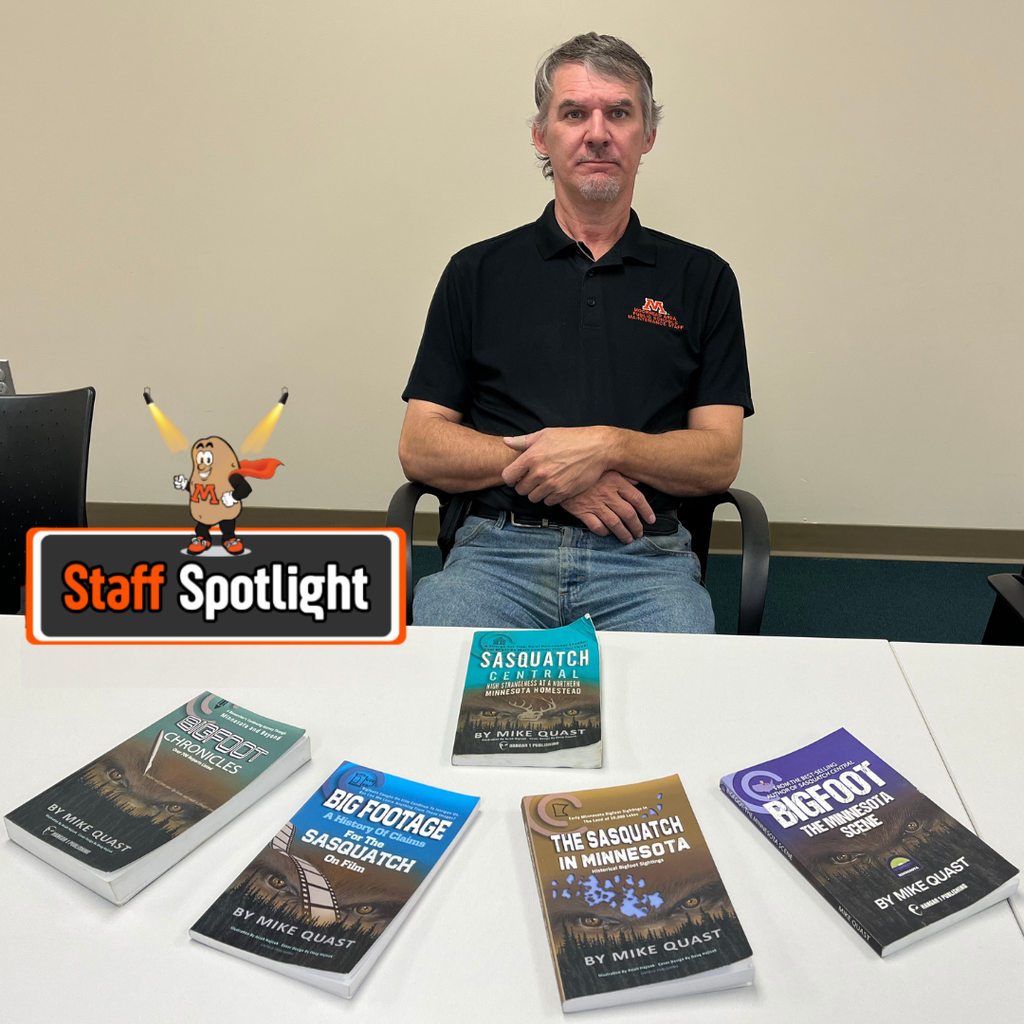 Mike Quast with his books