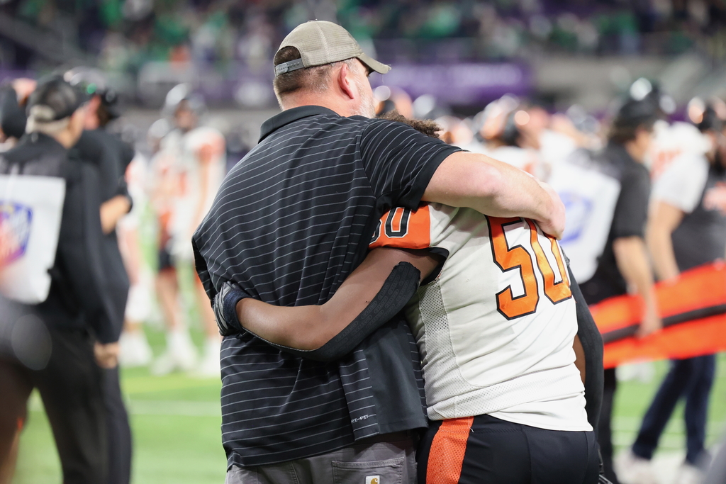 Hug between #50 and coach