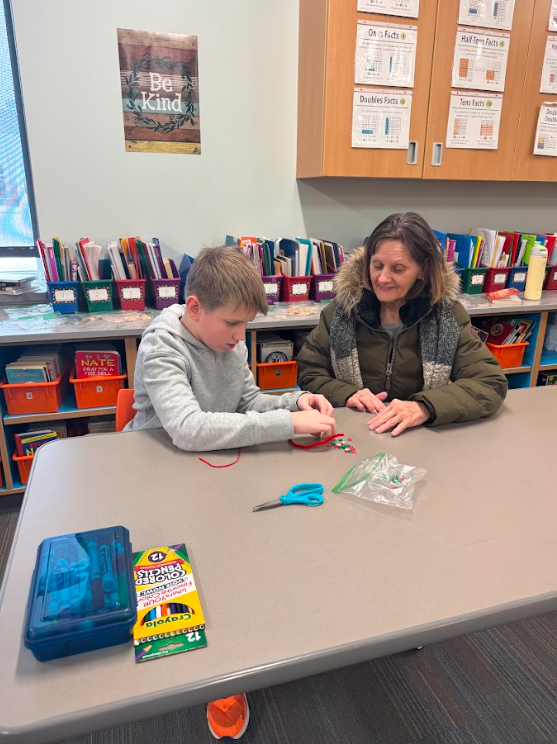 4th graders and bethany residents making artwork together