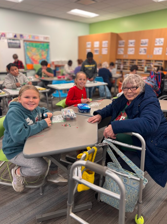 4th graders and bethany residents making artwork together