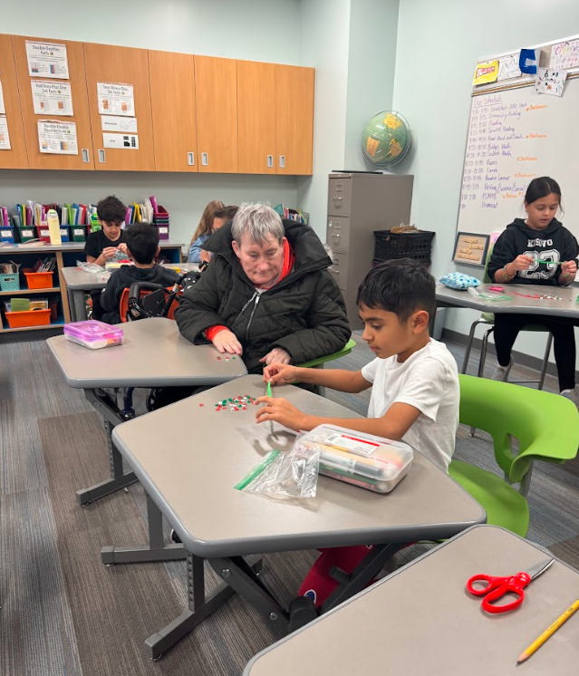 4th graders and bethany residents making artwork together