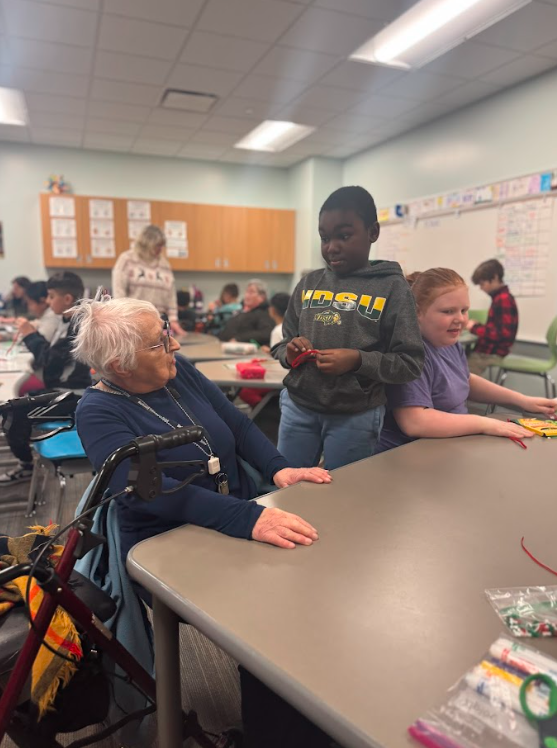 4th graders and bethany residents making artwork together