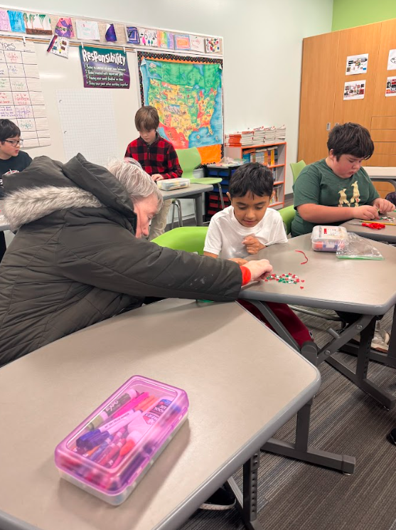4th graders and bethany residents making artwork together