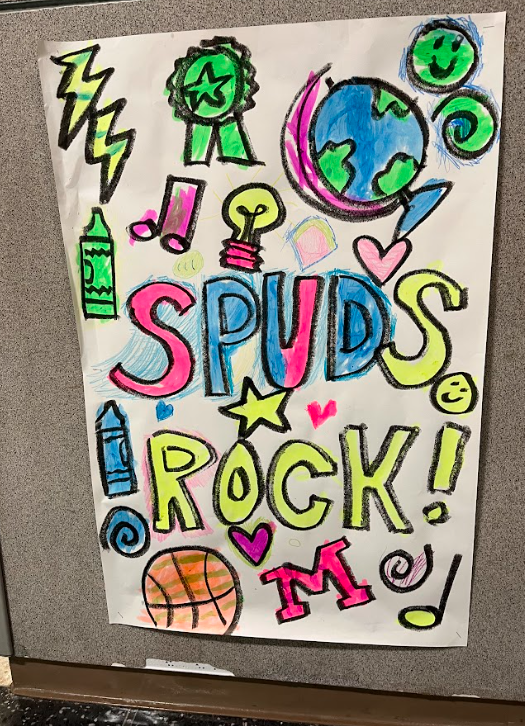 artwork that reads spuds rock