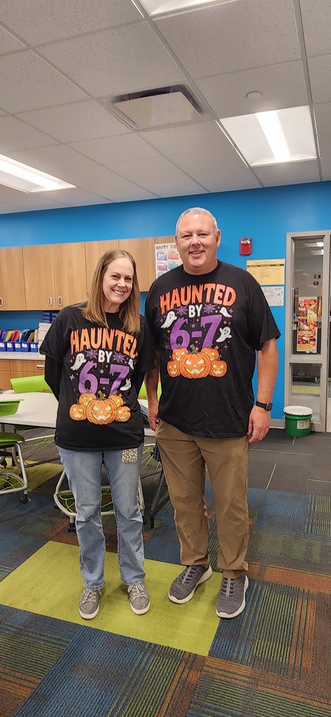 Teachers wearing 6 7 shirts