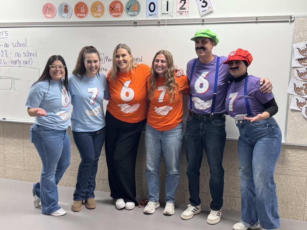 Teachers wearing 6 7 shirts