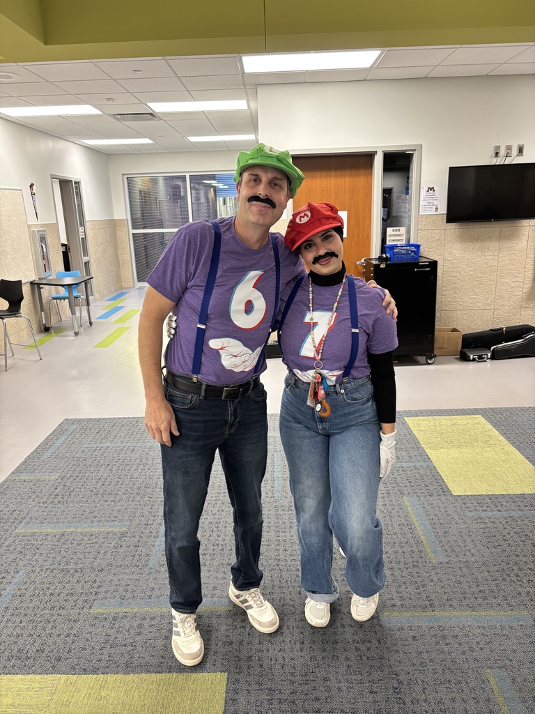 Teachers wearing 6 7 shirts