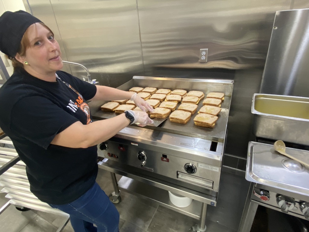 Gabby making grilled cheese