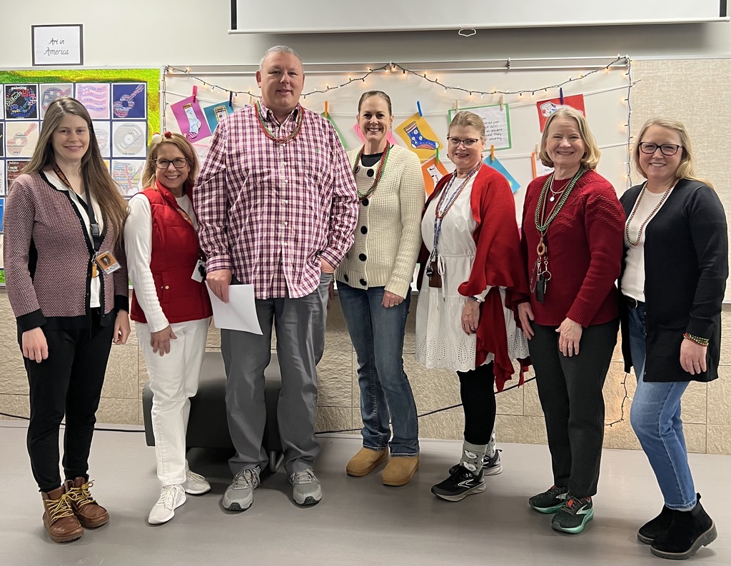 Staff Dressed in red and white