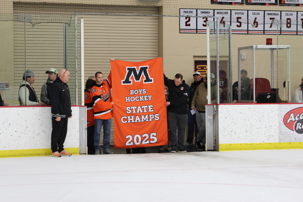 Putting up the Hockey State Banner