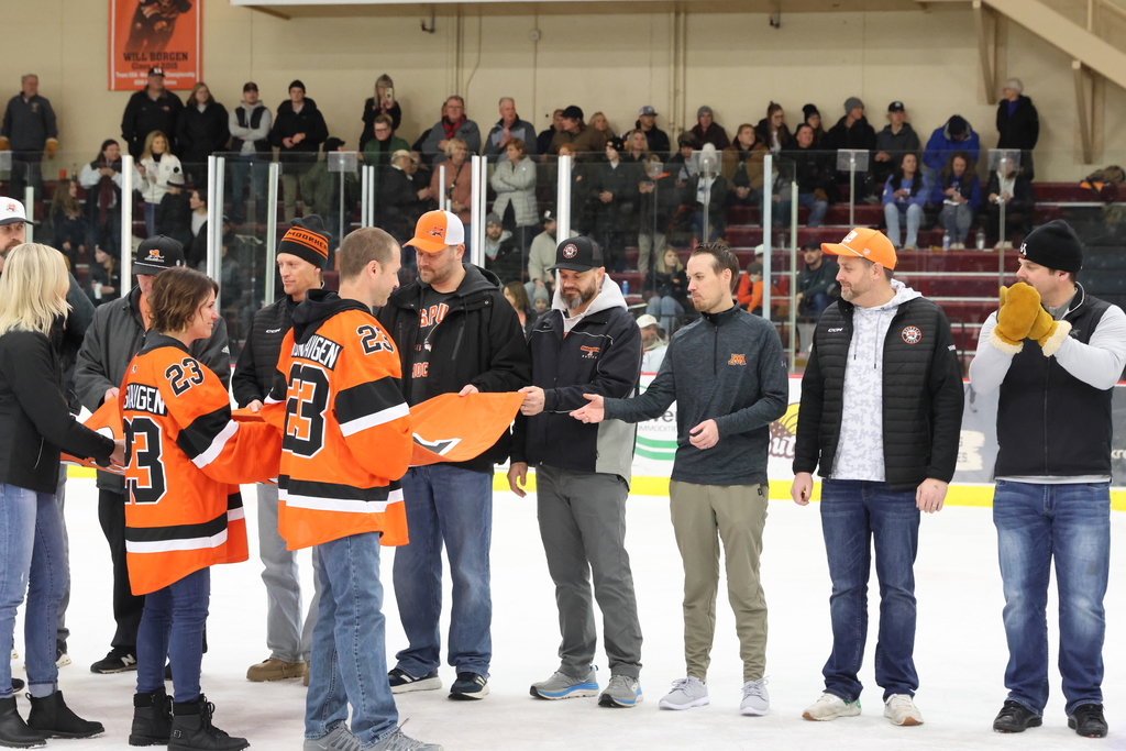 Putting up the Hockey State Banner