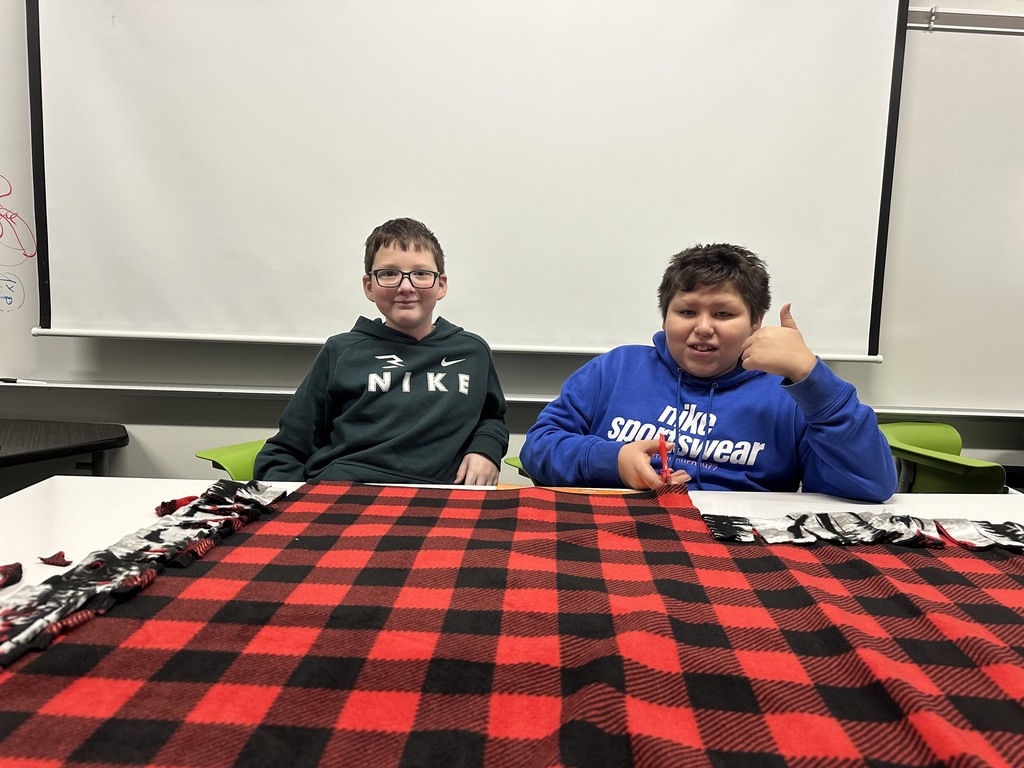 Students at Horizon West Making blankets