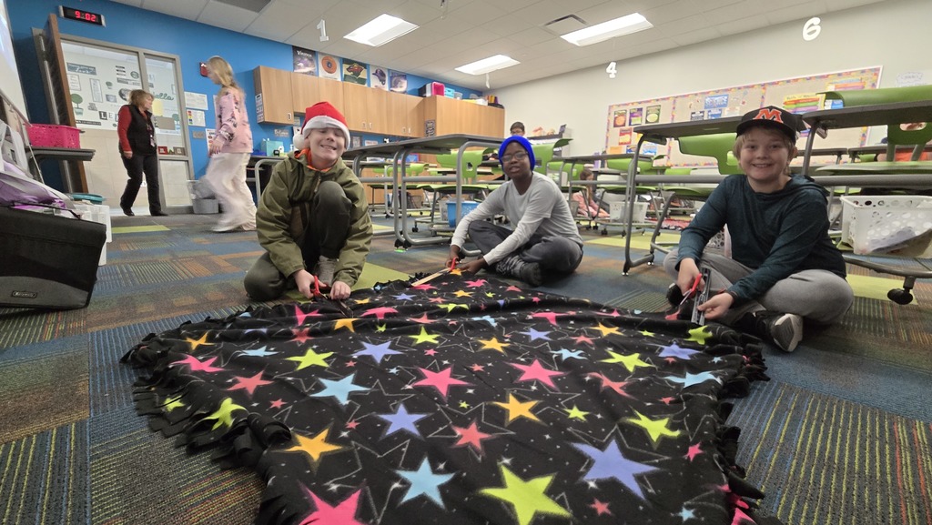 Students at Horizon West Making blankets