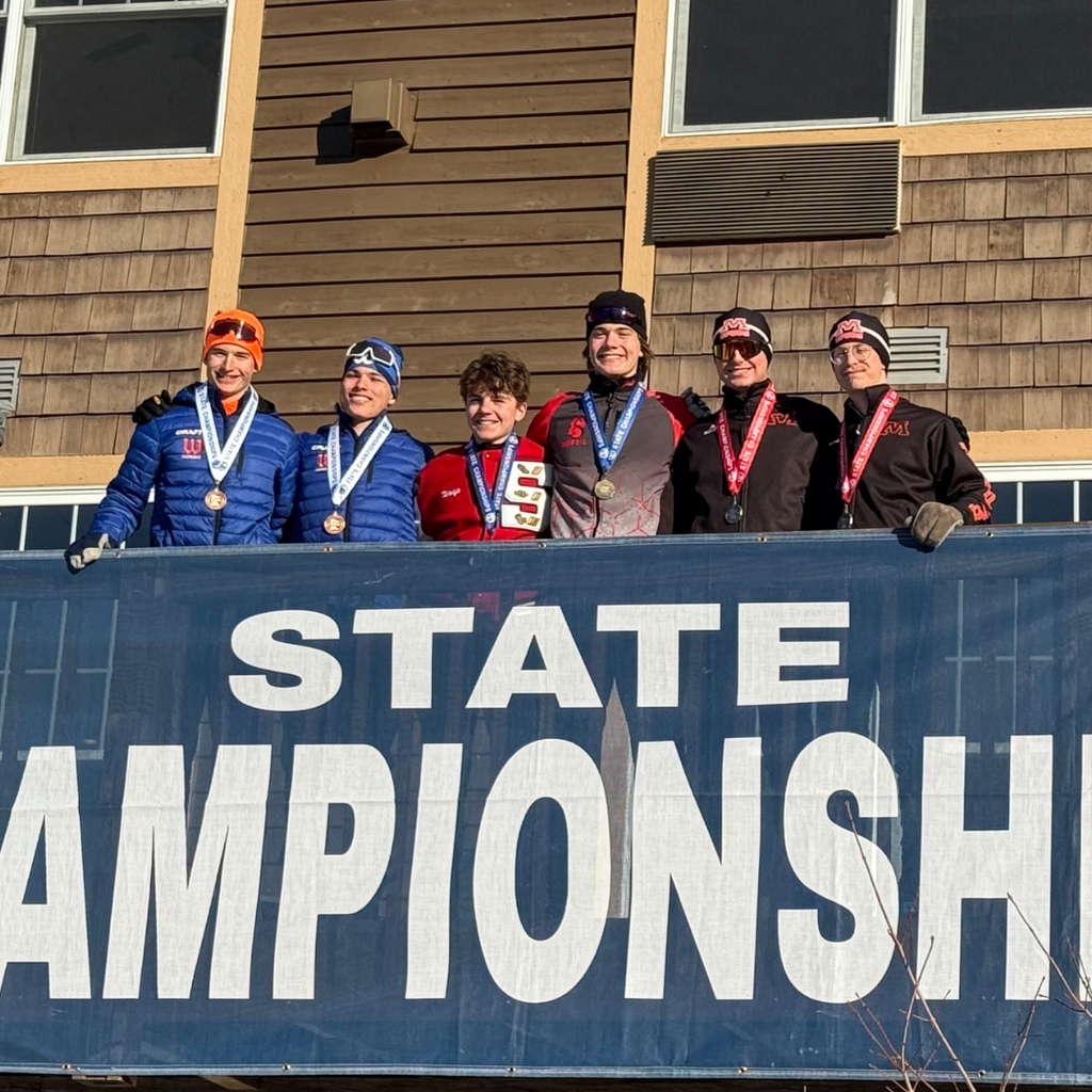 Wes Brouillard & Tavan Schlichting on the medalist stand after the team sprint event